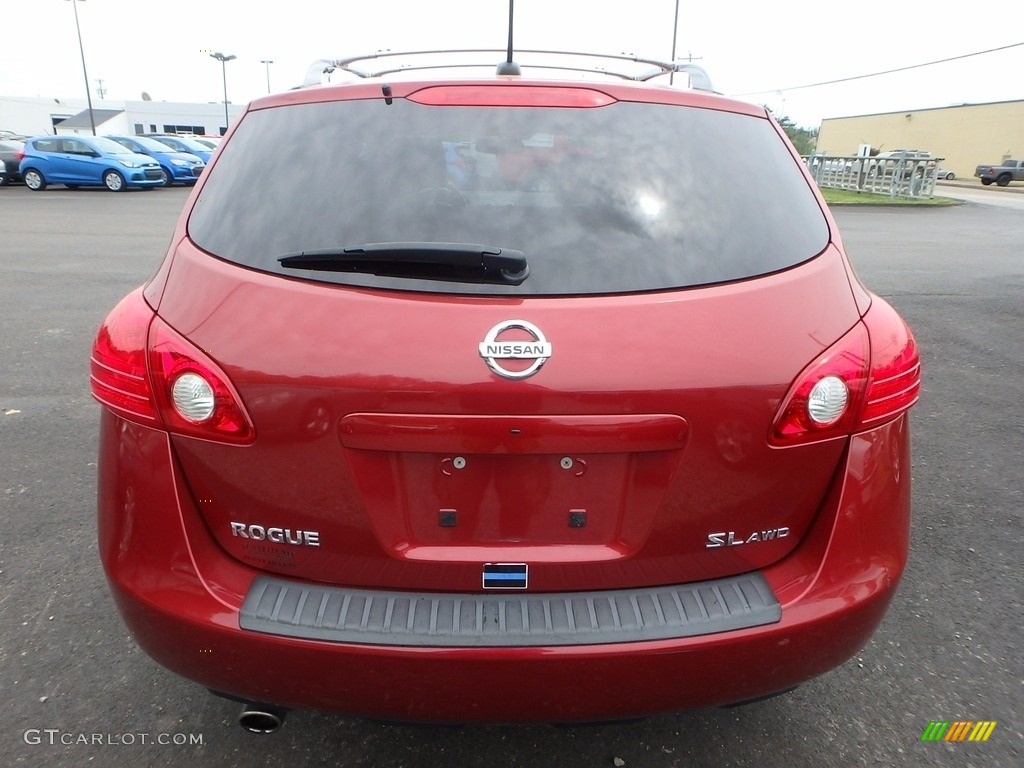 2010 Rogue SL AWD - Venom Red / Black photo #3