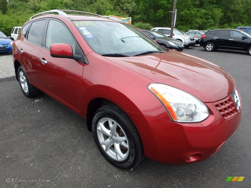 2010 Rogue SL AWD - Venom Red / Black photo #5