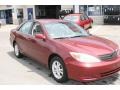 2004 Salsa Red Pearl Toyota Camry LE  photo #3