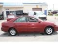 2004 Salsa Red Pearl Toyota Camry LE  photo #4