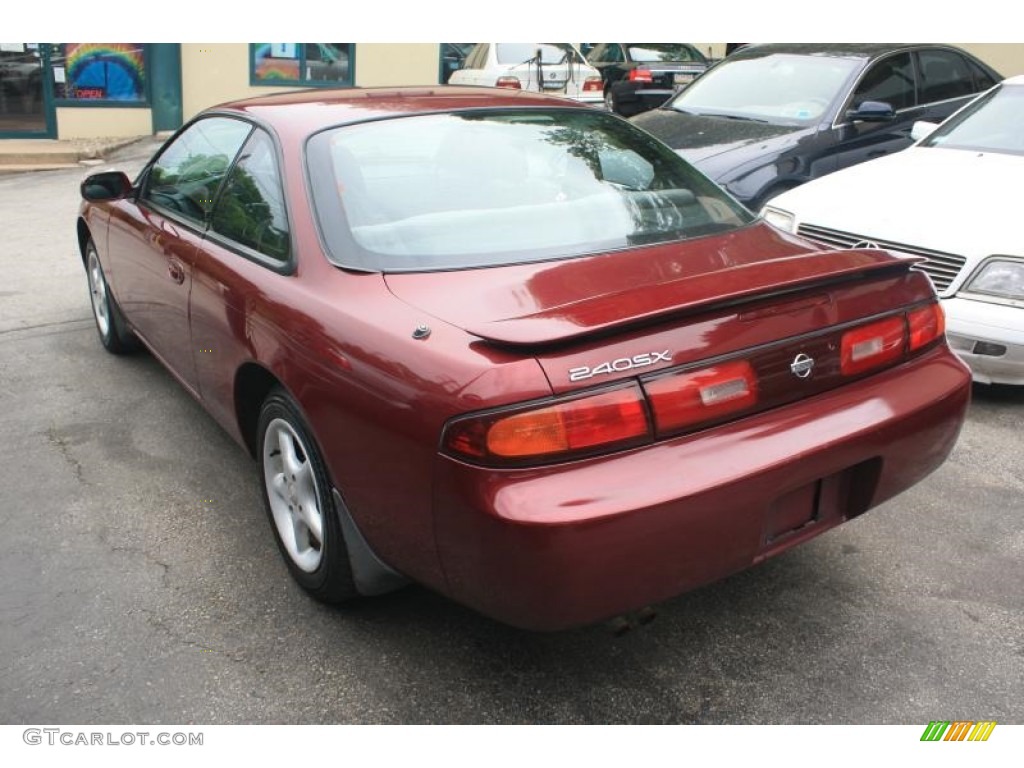 Ruby Red Pearl 1995 Nissan 240SX Coupe Exterior Photo #120657131