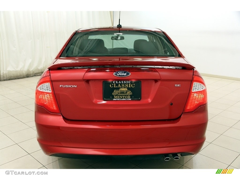 2011 Fusion SE - Red Candy Metallic / Charcoal Black photo #13