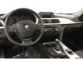 Black 2014 BMW 3 Series 320i xDrive Sedan Dashboard