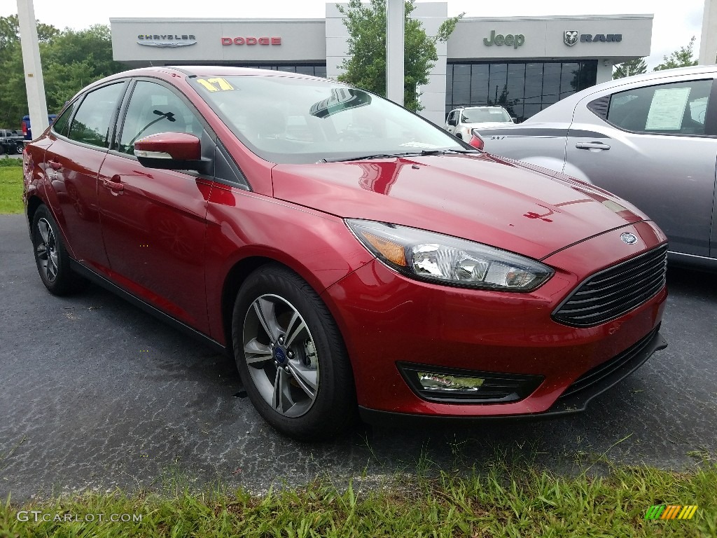 Ruby Red 2017 Ford Focus SE Sedan Exterior Photo #121035828