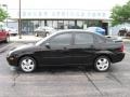 2006 Pitch Black Ford Focus ZX4 SES Sedan  photo #1