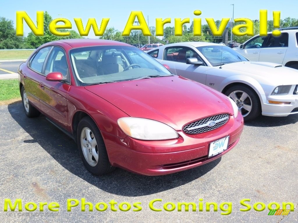 2001 Taurus SE - Toreador Red Metallic / Medium Graphite photo #1