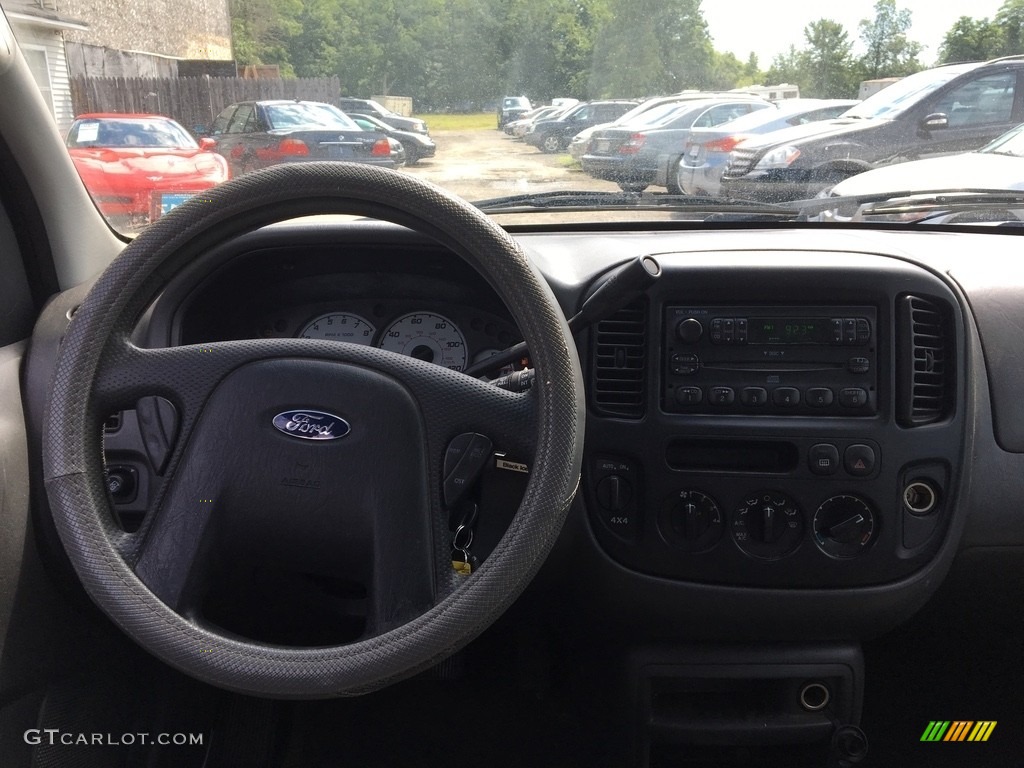 2004 Escape XLS V6 4WD - True Blue Metallic / Medium/Dark Flint photo #7