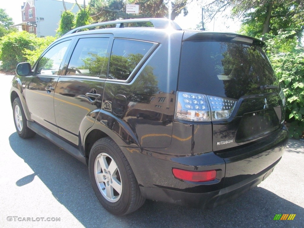 2010 Outlander ES 4WD - Labrador Black Pearl / Black photo #6