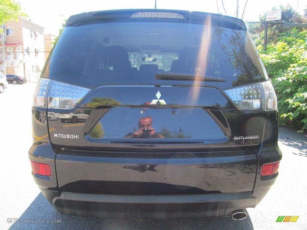 2010 Outlander ES 4WD - Labrador Black Pearl / Black photo #7