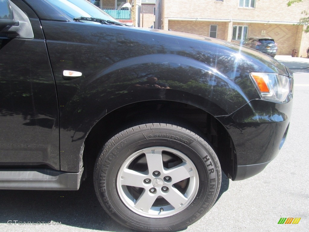 2010 Outlander ES 4WD - Labrador Black Pearl / Black photo #10