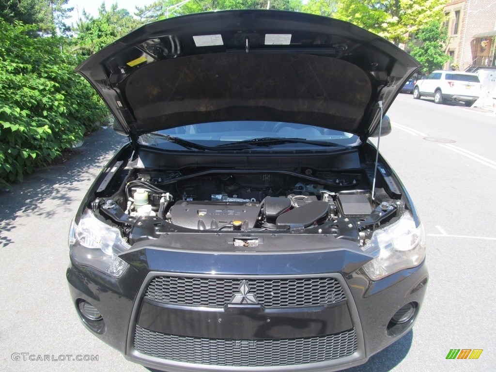 2010 Outlander ES 4WD - Labrador Black Pearl / Black photo #17
