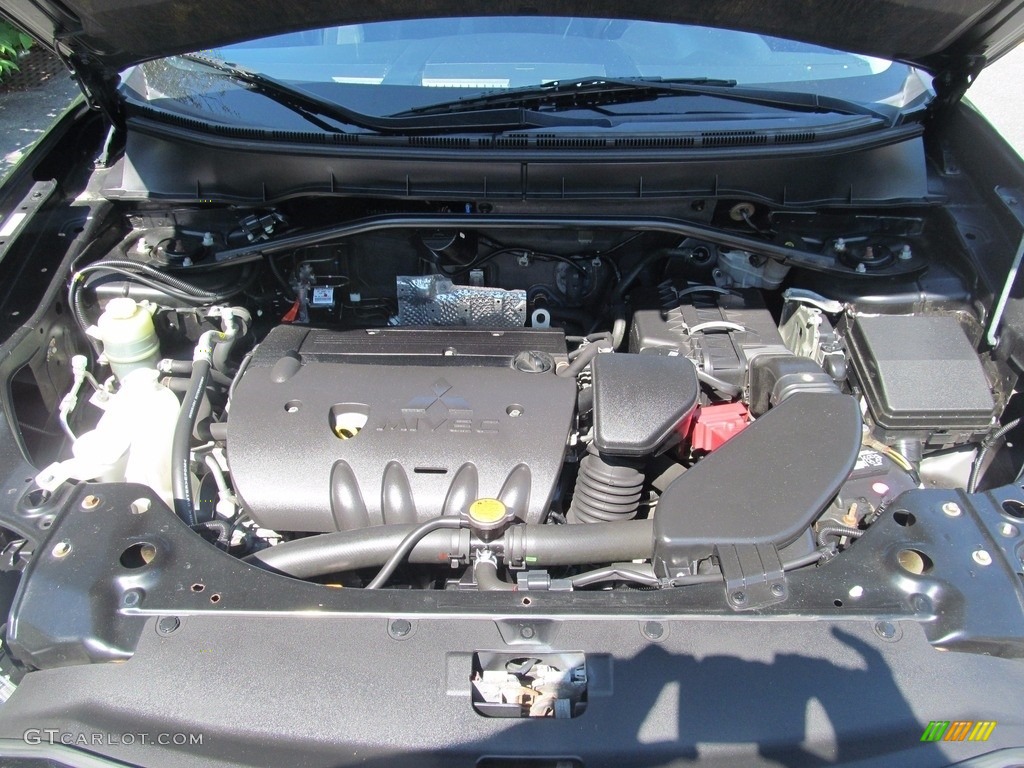 2010 Outlander ES 4WD - Labrador Black Pearl / Black photo #18