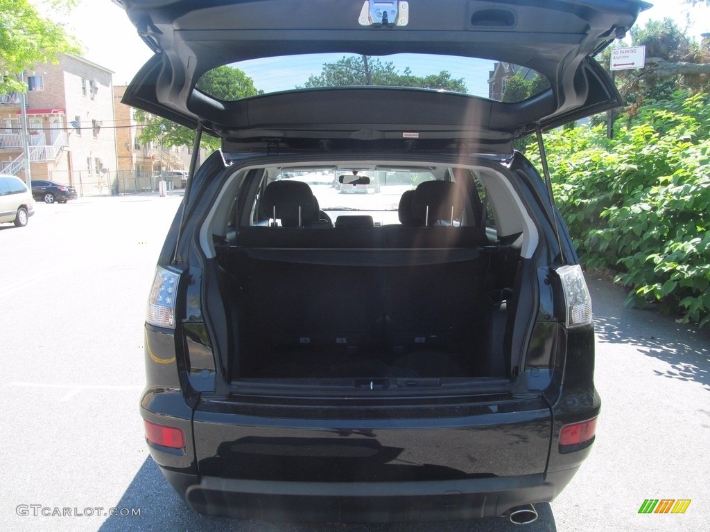 2010 Outlander ES 4WD - Labrador Black Pearl / Black photo #19