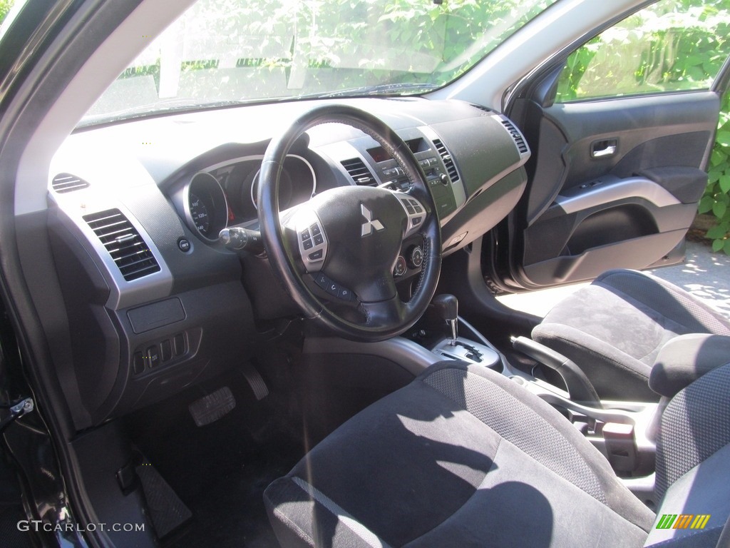 2010 Outlander ES 4WD - Labrador Black Pearl / Black photo #21