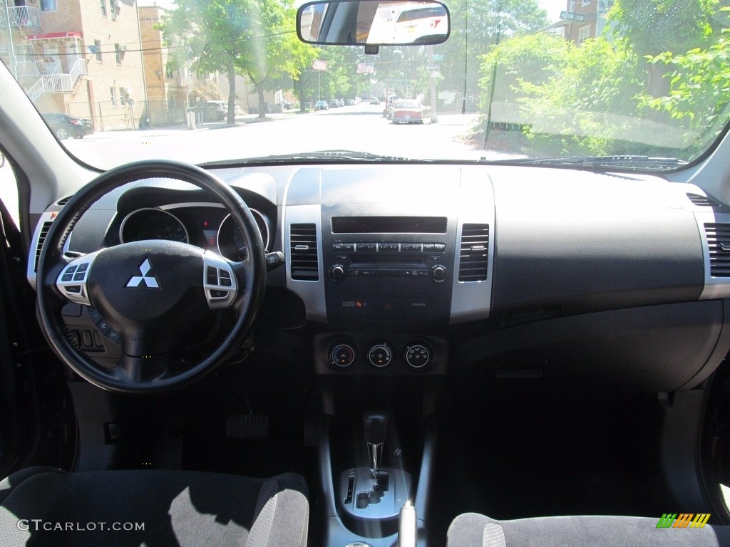 2010 Outlander ES 4WD - Labrador Black Pearl / Black photo #30