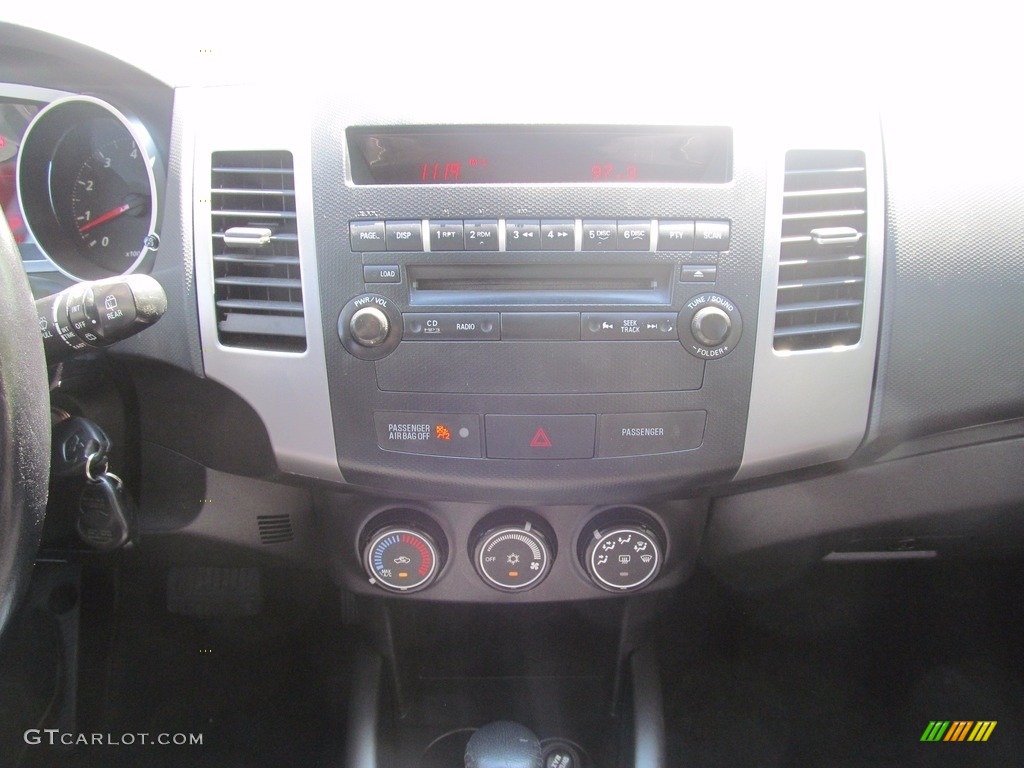 2010 Outlander ES 4WD - Labrador Black Pearl / Black photo #37