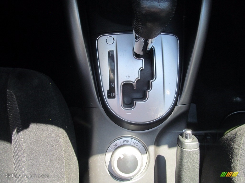 2010 Outlander ES 4WD - Labrador Black Pearl / Black photo #38