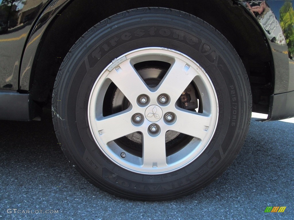 2010 Outlander ES 4WD - Labrador Black Pearl / Black photo #42