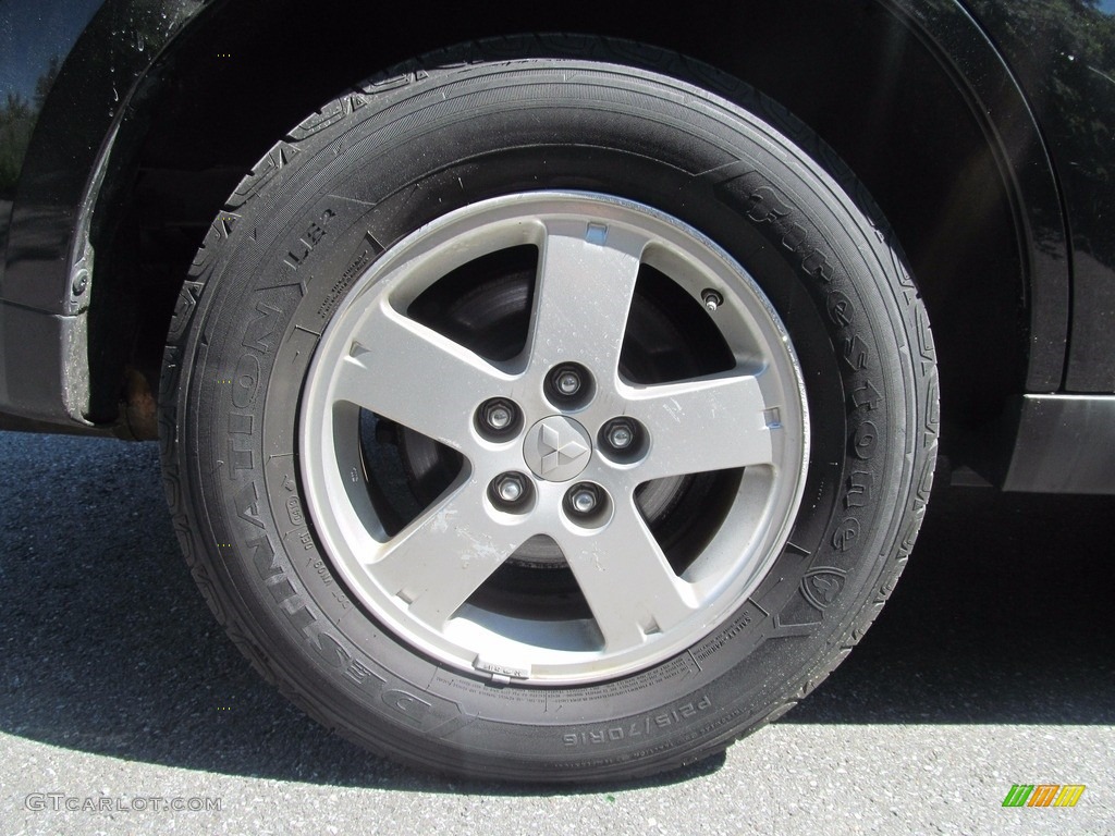 2010 Outlander ES 4WD - Labrador Black Pearl / Black photo #44