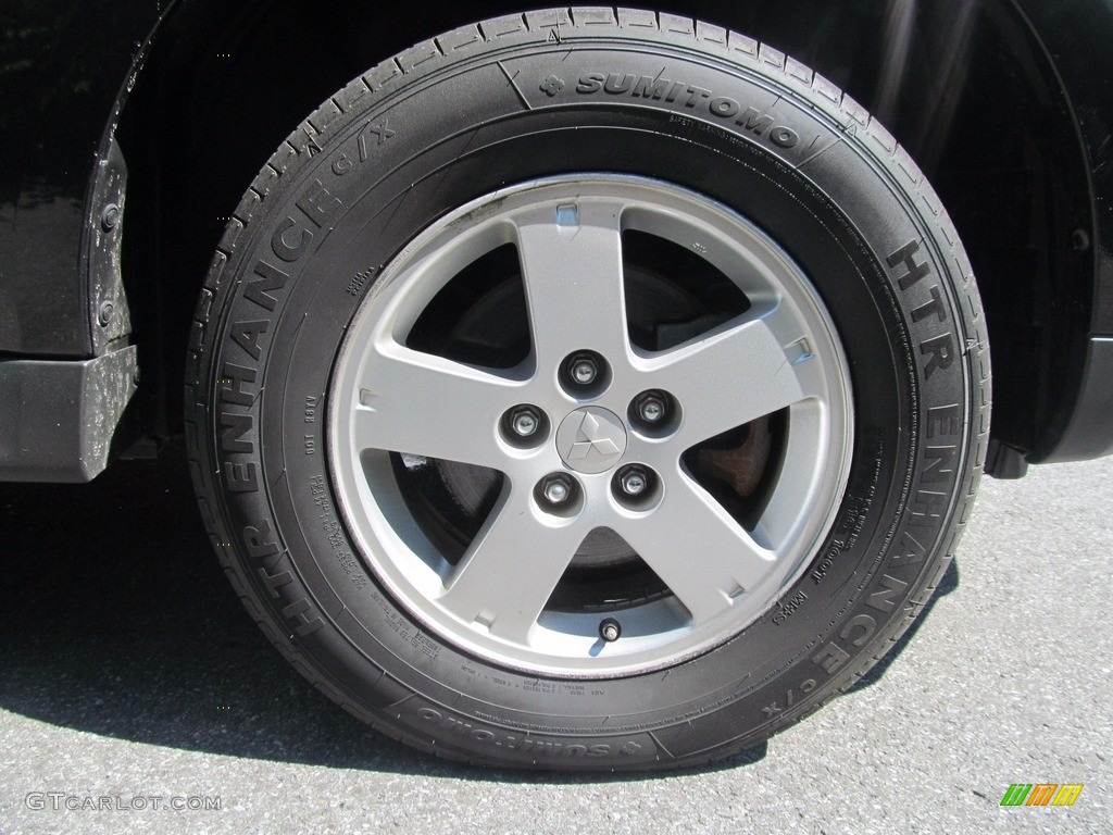 2010 Outlander ES 4WD - Labrador Black Pearl / Black photo #46