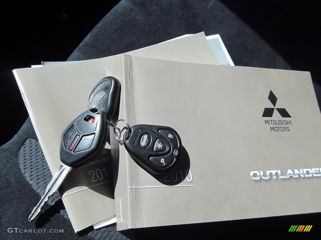 2010 Outlander ES 4WD - Labrador Black Pearl / Black photo #49