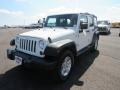 Stone White 2010 Jeep Wrangler Unlimited Sport 4x4