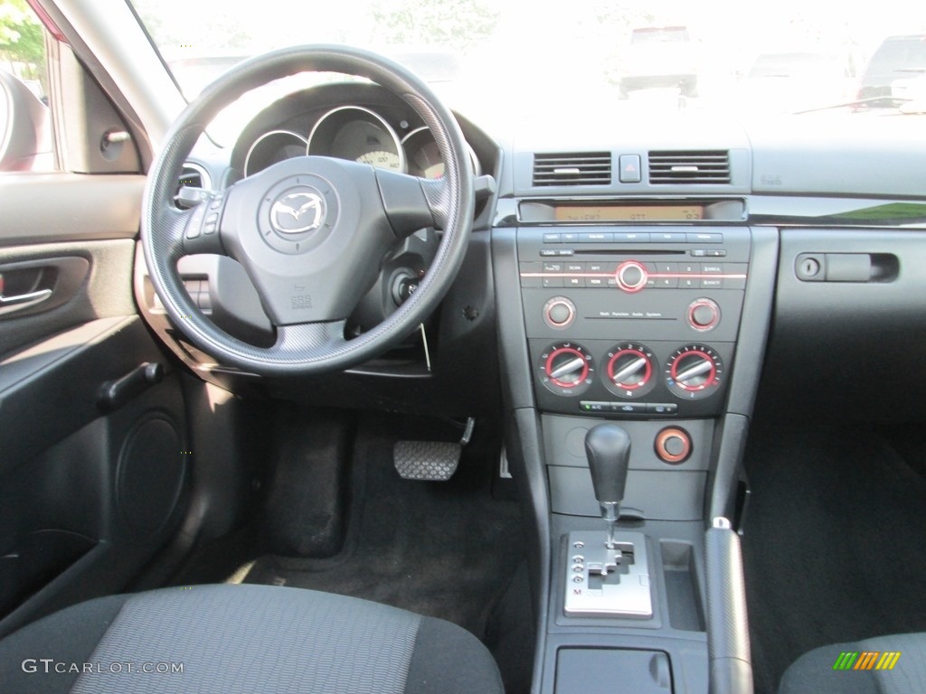 2009 MAZDA3 i Touring Sedan - Copper Red Mica / Black photo #10