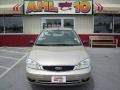 2006 Pueblo Gold Metallic Ford Focus ZX4 SE Sedan  photo #1