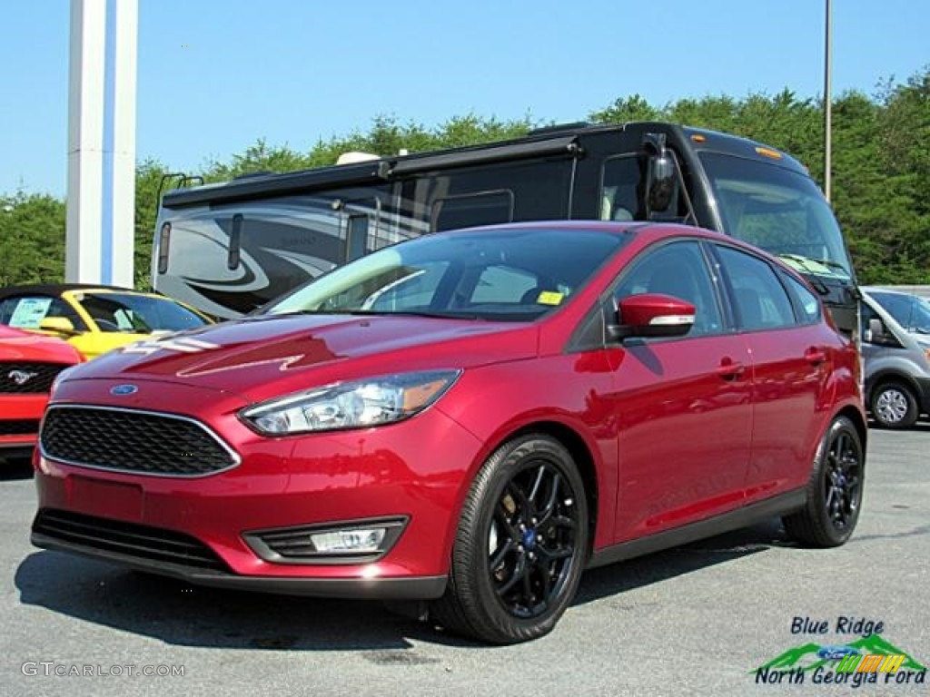 2016 Focus SE Hatch - Ruby Red / Medium Light Stone photo #1