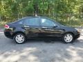 2010 Ebony Black Ford Focus SEL Sedan  photo #8