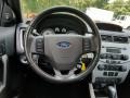 2010 Ebony Black Ford Focus SEL Sedan  photo #16