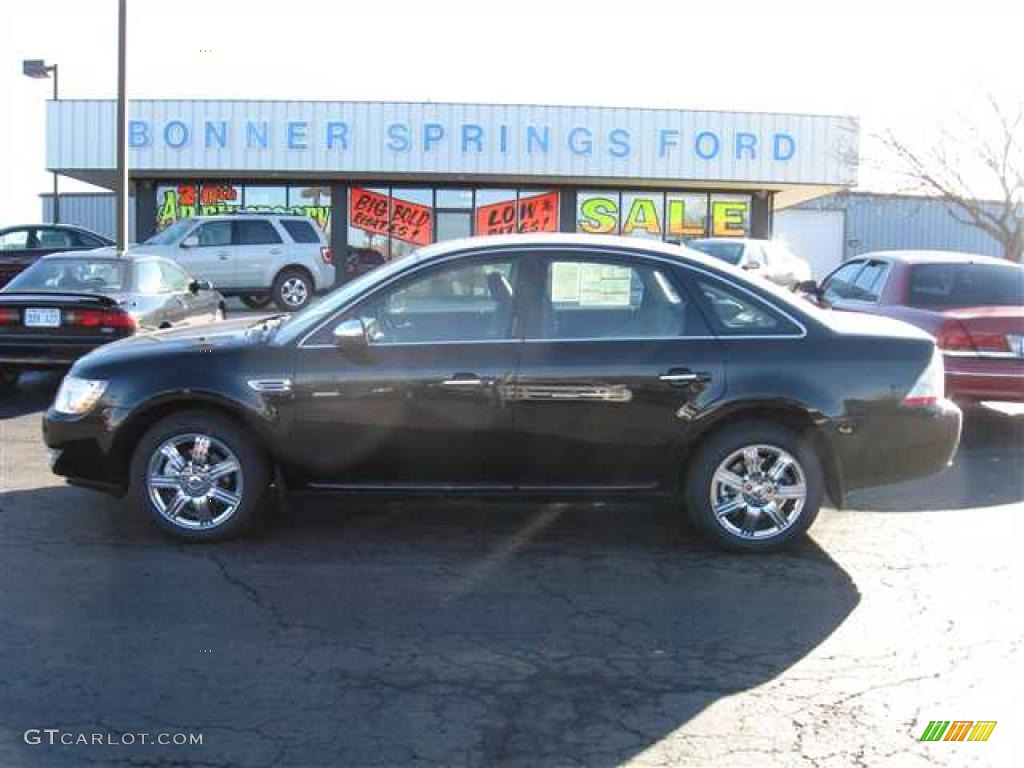 Tuxedo Black Metallic Ford Taurus