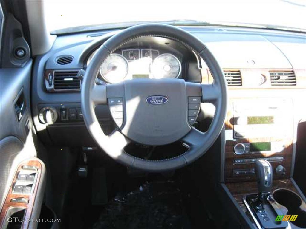 2009 Taurus Limited AWD - Tuxedo Black Metallic / Black photo #6