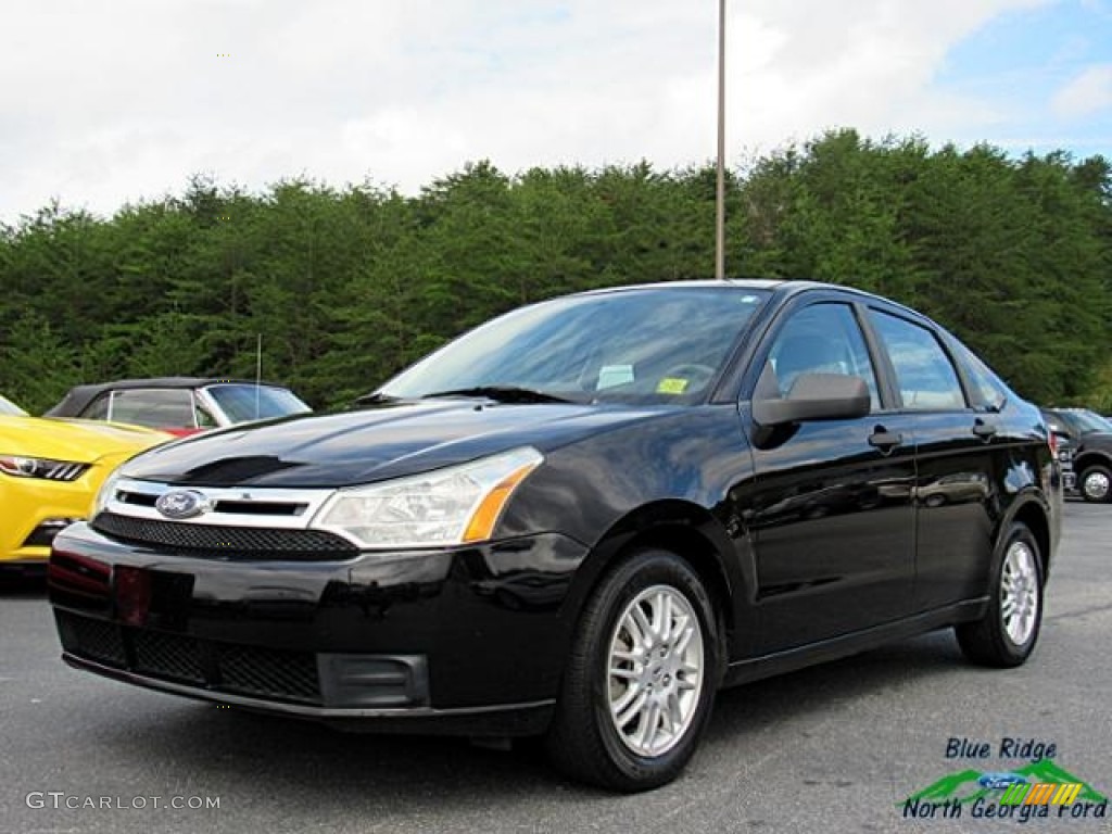 2011 Focus SE Sedan - Ebony Black / Medium Stone photo #1