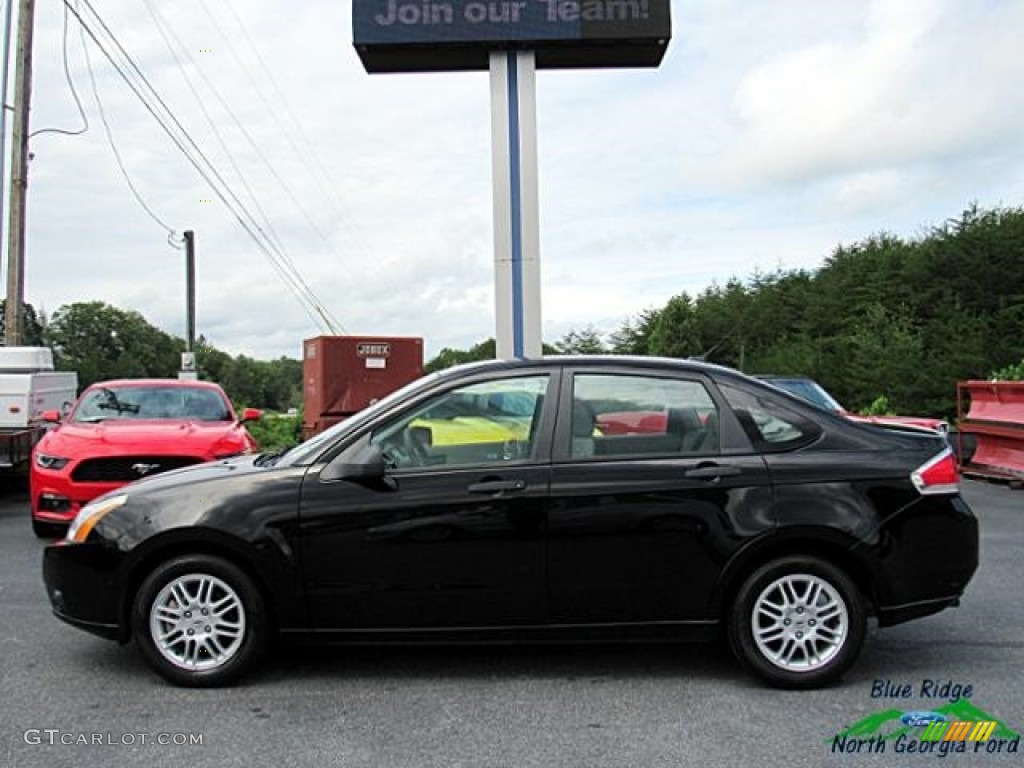 2011 Focus SE Sedan - Ebony Black / Medium Stone photo #2