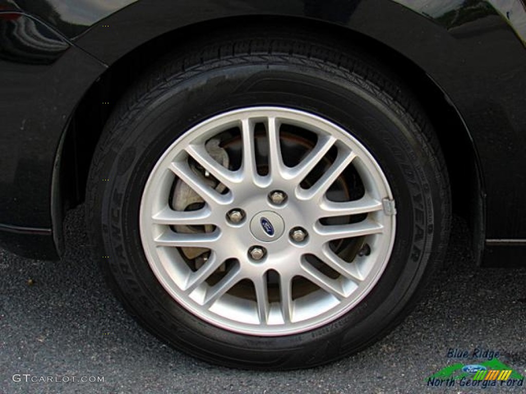 2011 Focus SE Sedan - Ebony Black / Medium Stone photo #9