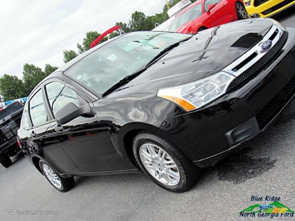 2011 Focus SE Sedan - Ebony Black / Medium Stone photo #32