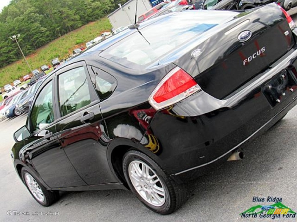 2011 Focus SE Sedan - Ebony Black / Medium Stone photo #34