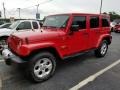 Flame Red 2014 Jeep Wrangler Unlimited Sahara 4x4