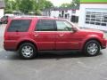 2005 Vivid Red Metallic Lincoln Navigator Luxury 4x4  photo #5