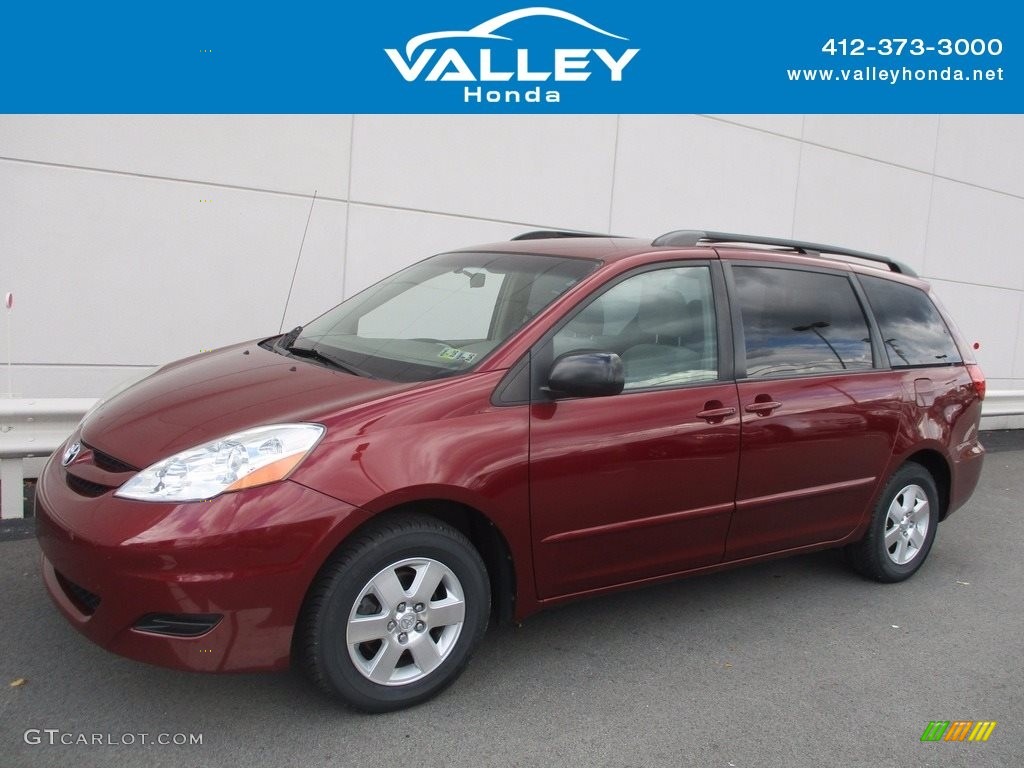 2010 Sienna LE - Salsa Red Pearl / Taupe photo #1