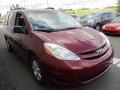 2010 Salsa Red Pearl Toyota Sienna LE  photo #7