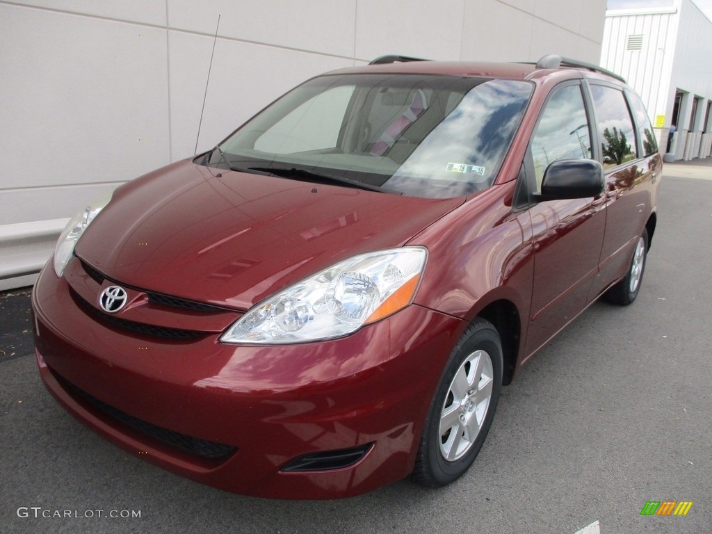 2010 Sienna LE - Salsa Red Pearl / Taupe photo #9