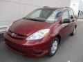 2010 Salsa Red Pearl Toyota Sienna LE  photo #9