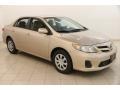 2011 Sandy Beach Metallic Toyota Corolla LE #122684379