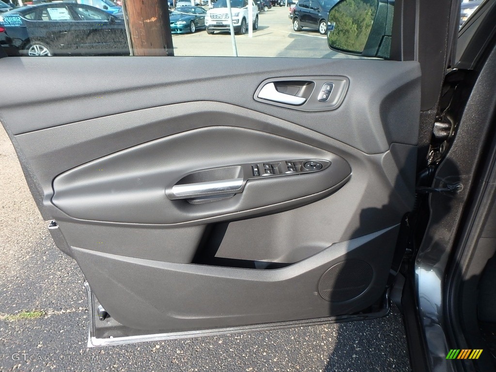 2018 Ford Escape SEL 4WD Charcoal Black Door Panel Photo #122838088