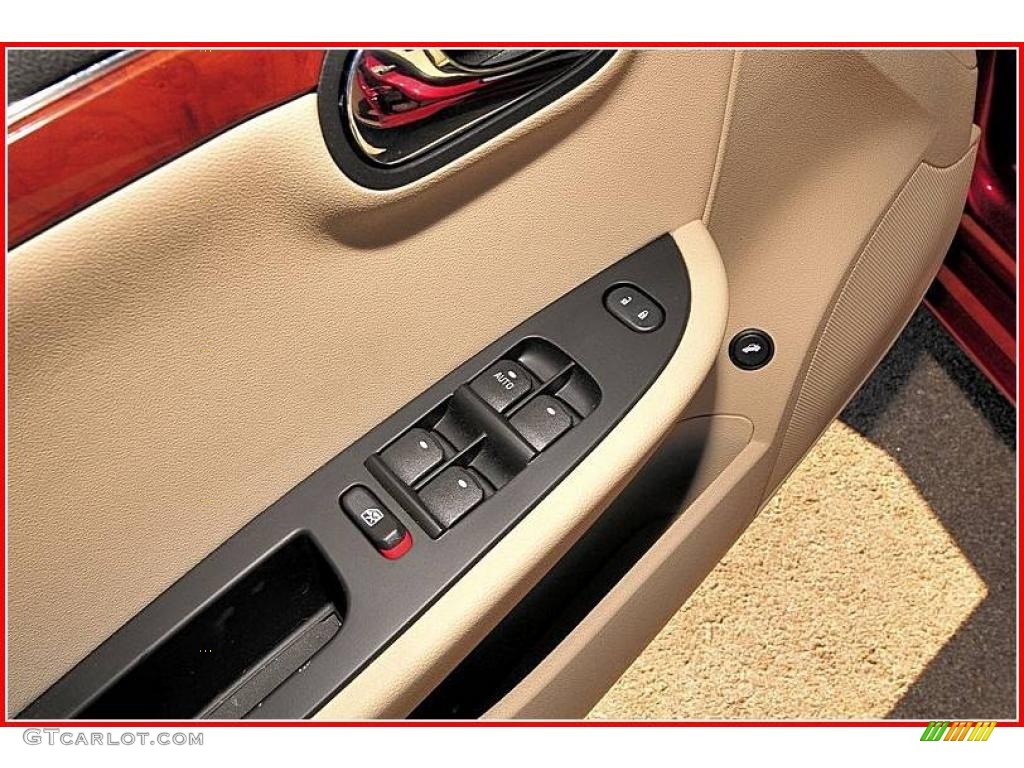 2009 Aura XR - Red Jewel Tintcoat / Tan photo #12
