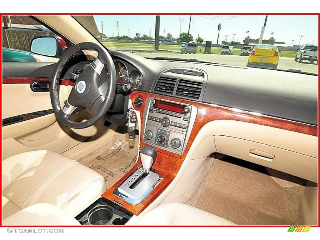 2009 Aura XR - Red Jewel Tintcoat / Tan photo #17