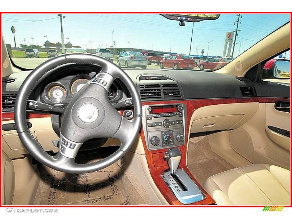 2009 Aura XR - Red Jewel Tintcoat / Tan photo #18