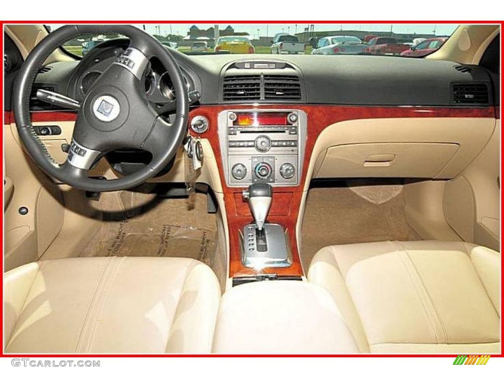 2009 Aura XR - Red Jewel Tintcoat / Tan photo #20